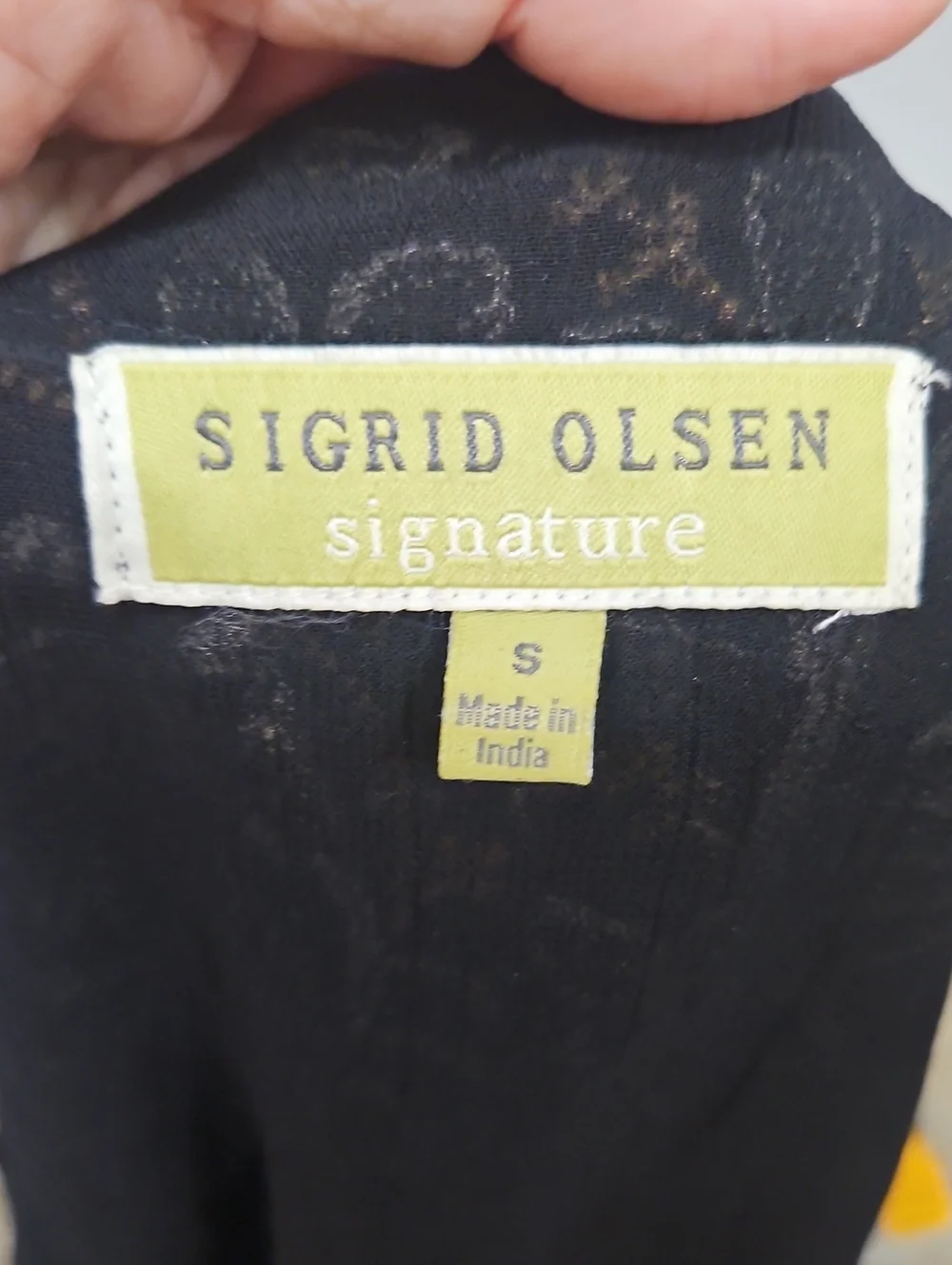 Sigrid Olsen Black Top with Yellow-Green Label Detail